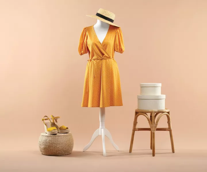 Yellow dress on mannequin